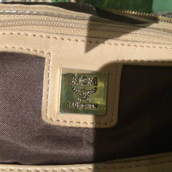 MCM Accessories - Used once. Soft leather, large purse with shoulder strap. MGM Munchen